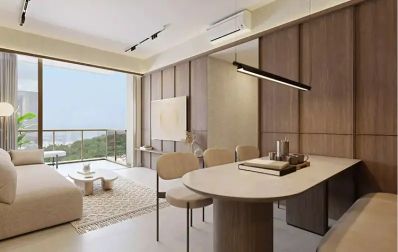 2 Bedroom Unit Interior: A spacious living room with large windows offering a panoramic cityscape view, decorated with plush seating and elegant hanging lights.