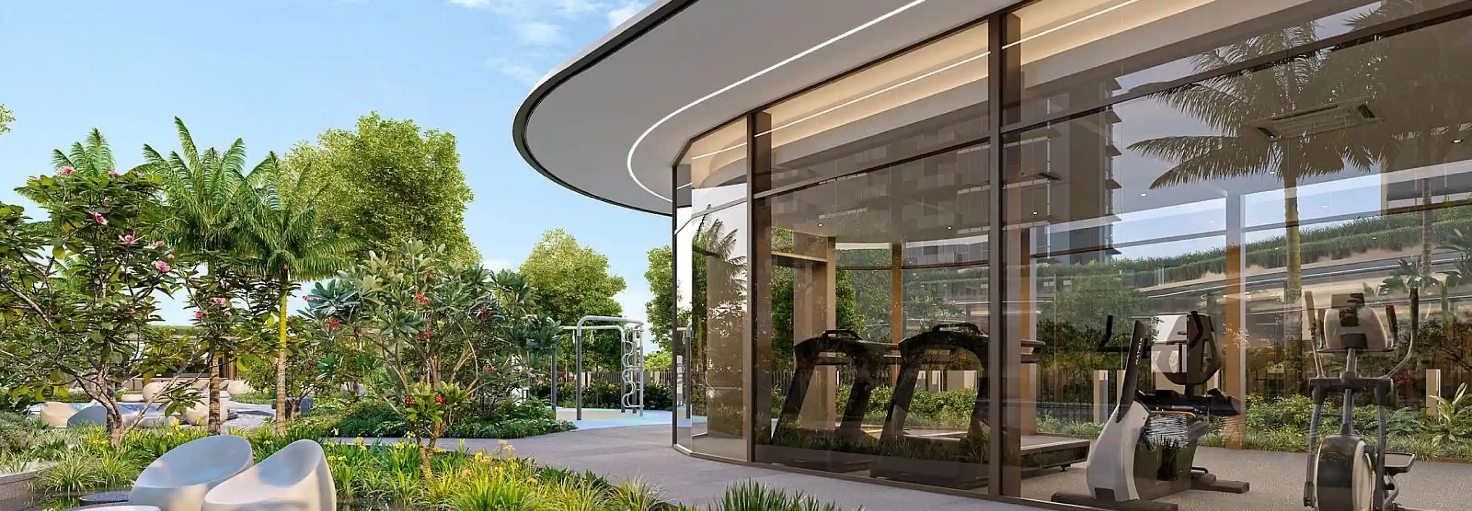 Modern Gym Interior: The interior of Hillhaven’s gym with high-end fitness equipment and floor-to-ceiling windows, providing a tranquil atmosphere that combines exercise with a serene garden view.
